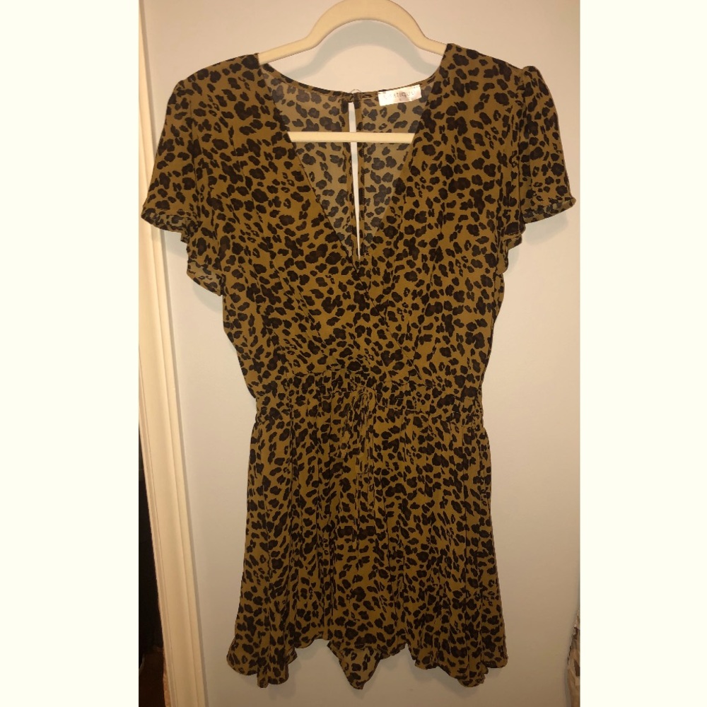 Cheetah Print, short sleeved, v-neck romper.